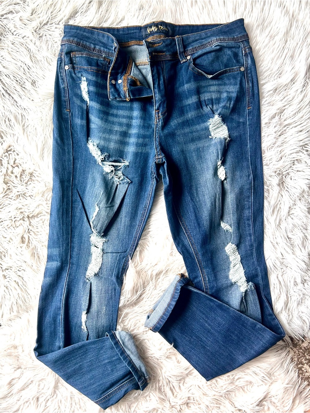 Distressed Women's Blue Denim Jeans